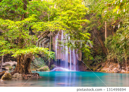 Waterfall in tropical forest with green tree and emerald lake, Erawan, Thailand Waterfall in tropical forest with green tree and emerald lake, Erawan, Thailand 131499894