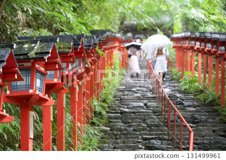 The approach to Kifune Shrine, with red lanterns and stone steps 131499961