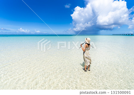 Emerald beach and young woman 131500091