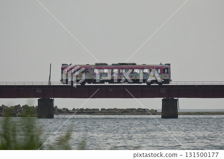 Tanetsu KTR800 series (character wrapping) running on the Yura River Bridge 1 131500177
