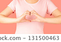 Breast Cancer Awareness in October. Woman hand made heart shape on her chest for support people who live with breast cancer. Women's health care concept. 131500463