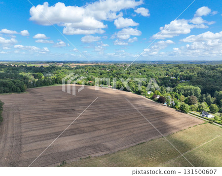 Aerial view of farmland surrounded by forest in the Belgian province of Walloon Brabant. 131500607
