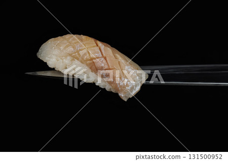 pieces of delicious japanese sushi on a black background pieces of delicious japanese sushi on a black background 131500952