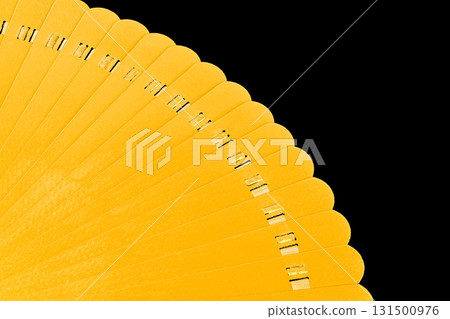 A yellow object with a black background A yellow object with a black background 131500976