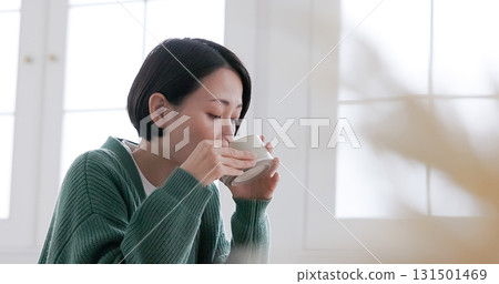 Middle woman drinking coffee Middle woman drinking coffee 131501469