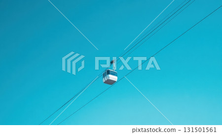 Cable Car Suspended In Clear Blue Sky. Scenic Aerial Transportation And Travel Concept 131501561