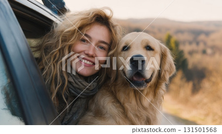 Woman And Golden Retriever Enjoying Scenic Drive. Joyful Road Trip With Pet Companion Woman And Golden Retriever Enjoying Scenic Drive. Joyful Road Trip With Pet Companion 131501568