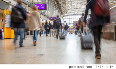 Busy Train Station With Travelers And Luggage. Commuters In Motion At Transportation Hub 131502016