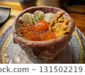 Seafood bowl: A luxurious bowl of salmon roe, scallops, sea urchin, seared beef, and raw egg 131502219