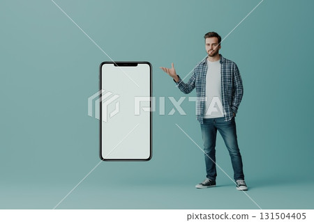 A young man presenting a floating smartphone screen against a teal background, wearing a casual outfit and gesturing towards it A young man presenting a floating smartphone screen against a teal background, wearing a casual outfit and gesturing towards it 131504405