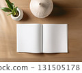 Books and a white book on the desk 131505178