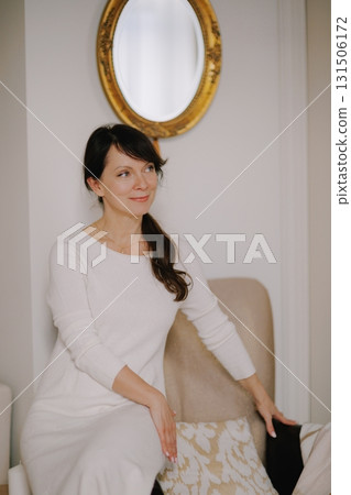 Mature woman smiling, looking away, reflecting, elegant portrait Mature woman smiling, looking away, reflecting, elegant portrait 131506172