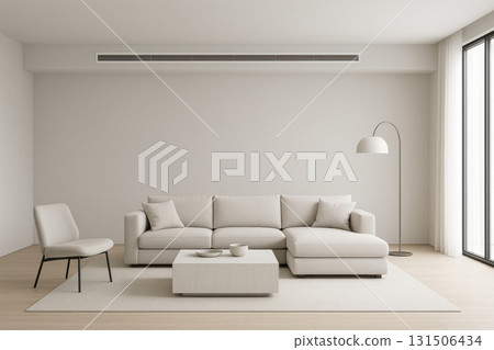 Minimalist living room with beige sectional sofa, modern armchair, low coffee table, and floor lamp, featuring sleek invisible climate control vent above, bright natural light 131506434