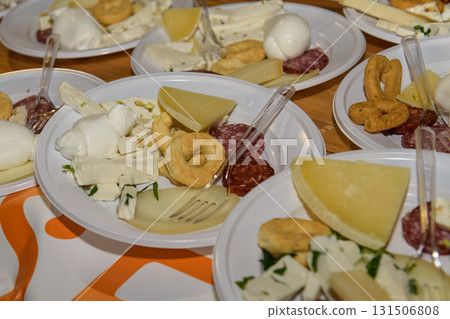 Cheese and Meat Platter With Traditional Snacks at a Local Food Festival Cheese and Meat Platter With Traditional Snacks at a Local Food Festival 131506808