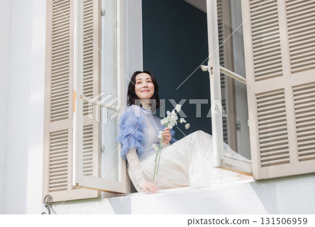 A woman with a bouquet 131506959