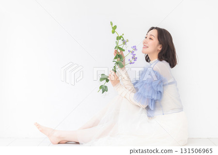 Portrait of woman with flowers Portrait of woman with flowers 131506965