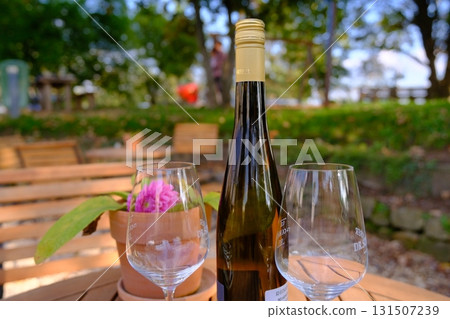 wine glasses on a wooden table wine glasses on a wooden table 131507239