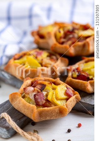 Traditional open pies (kalitki) close up. Traditional open pies (kalitki) close up. 131507805
