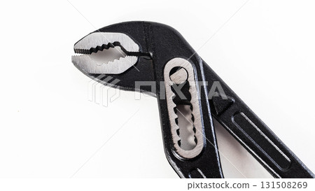 Adjusting pliers on a light background showing the grip and functionality for various tasks. White background Adjusting pliers on a light background showing the grip and functionality for various tasks. White background 131508269