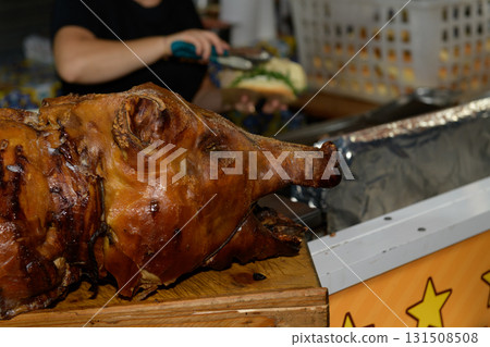 Grilled whole pig on a street food festival 131508508