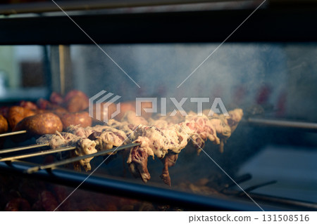 Apulian meat skewers Torcinelli Cooked on the grill Apulian meat skewers Torcinelli Cooked on the grill 131508516