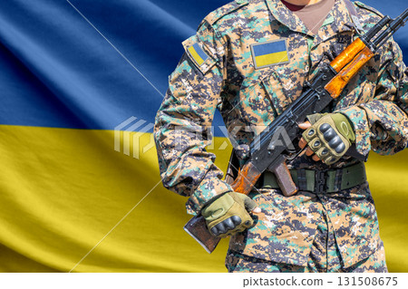 Ukraine flag with soldier holding assault rifle 131508675