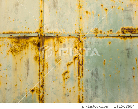 Rusty steel surface with screws and seams 131508694