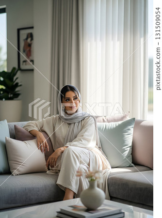 Pensive Woman Relaxing on a Modern Sofa 131509054