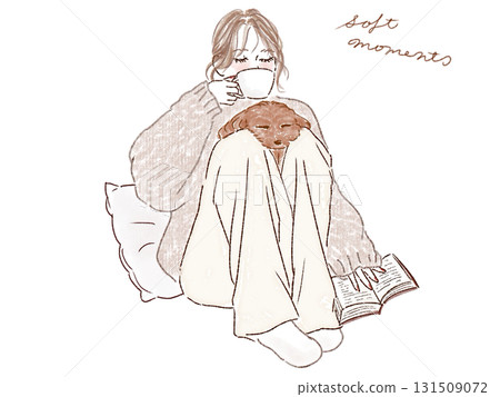 A woman and her dog sitting and drinking coffee and reading 131509072