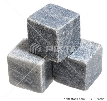 Cube of dark stone with scratches on isolated background 131509284