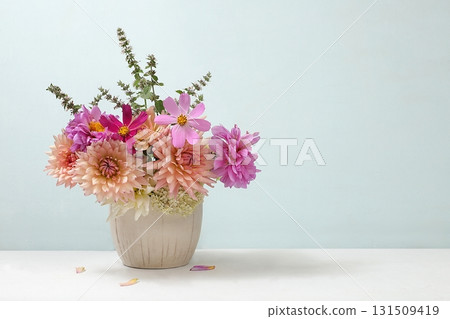 Beautiful dahlia flowers in a vase, abstract floral arrangement, autumn background with place for text, minimal holiday concept, still life, postcard. Happy birthday greetings, wedding 131509419
