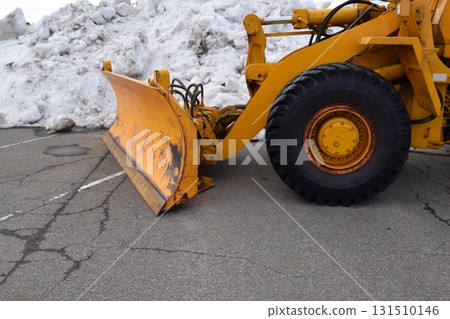 Snowplow waiting in a snowy country Snowplow waiting in a snowy country 131510146