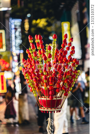 Strawberry candy at the night market in Yokohama Chinatown 131510372