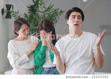 A man who is troubled by a woman crying 131511335