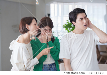 A woman gets angry at a man who made her friend cry 131511336