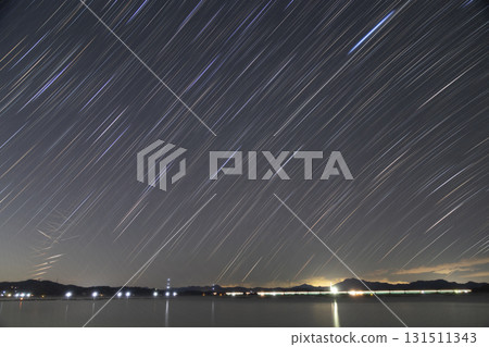 Winter starry scenery of Setouchi: Star trails and Starlink satellite tracks 131511343