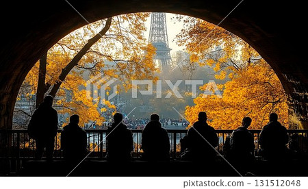 Silhouetted Spectators Admire Eiffel Tower Through Autumnal Arch 131512048