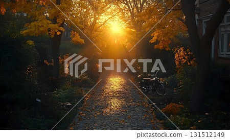 Golden Hour Sunlight Illuminates Cobblestone Path with Motorcycl 131512149