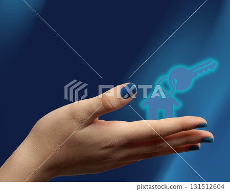 Woman hand holding digital key icon, concept of buying a new home 131512604