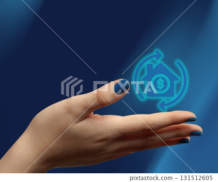 Female hand showing rising prices icon in real estate market 131512605