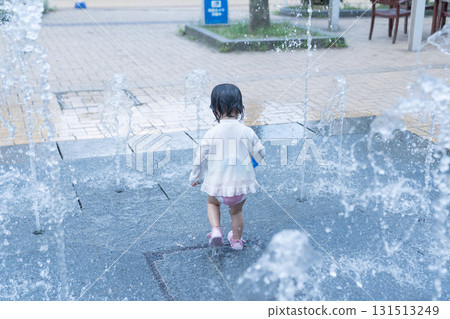 Japanese toddlers playing in the fountain at the apartment complex 131513249