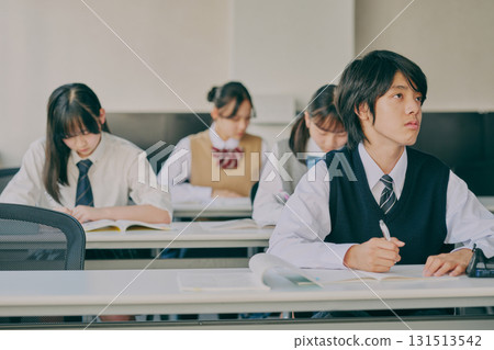 Junior high school students studying in a cram school classroom Junior high school students studying in a cram school classroom 131513542