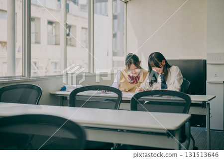 Junior high school students studying in a cram school classroom Junior high school students studying in a cram school classroom 131513646