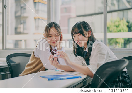 Junior high school students studying in a cram school classroom Junior high school students studying in a cram school classroom 131513891