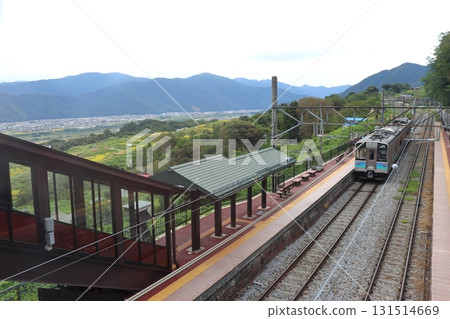 Local train at Obasute Station and Zenkoji Plain (JR Shinonoi Line) 131514669
