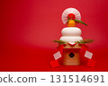 A photo of "Kagami mochi" placed on the right side, with a red background and a high pedestal. 131514691