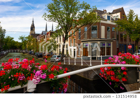 Streets along canal of Delft, Netherlands 131514958