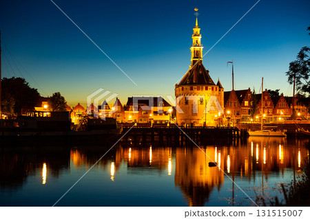 Night view of illuminated Hoofdtoren tower in Hoorn city port on lake Markermeer 131515007