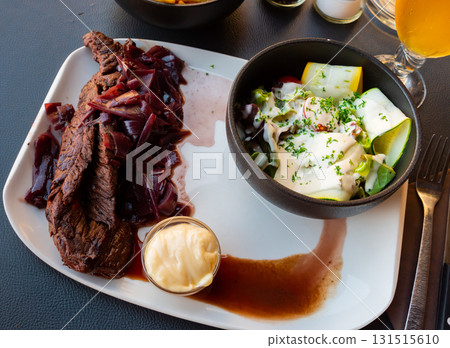 Veal steak with shallot sauce, French cuisine 131515610