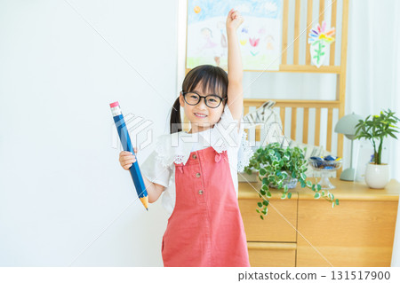 Image of a girl studying Image of a girl studying 131517900